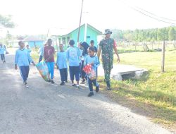 Babinsa Karya Bakti Bersama Siswa Sekolah