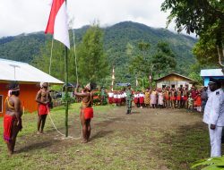 Satgas TMMD Kodim 1801/Manokwari Dan Masyarakat Kwau Laksanakan Upacara HUT RI Ke-79