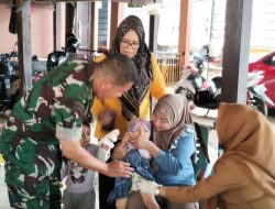 Babinsa Lamuru Kodim 1407/Bone Dampingi Kegiatan Posyandu Balita Dan Bumil Di Wilayah Binaan